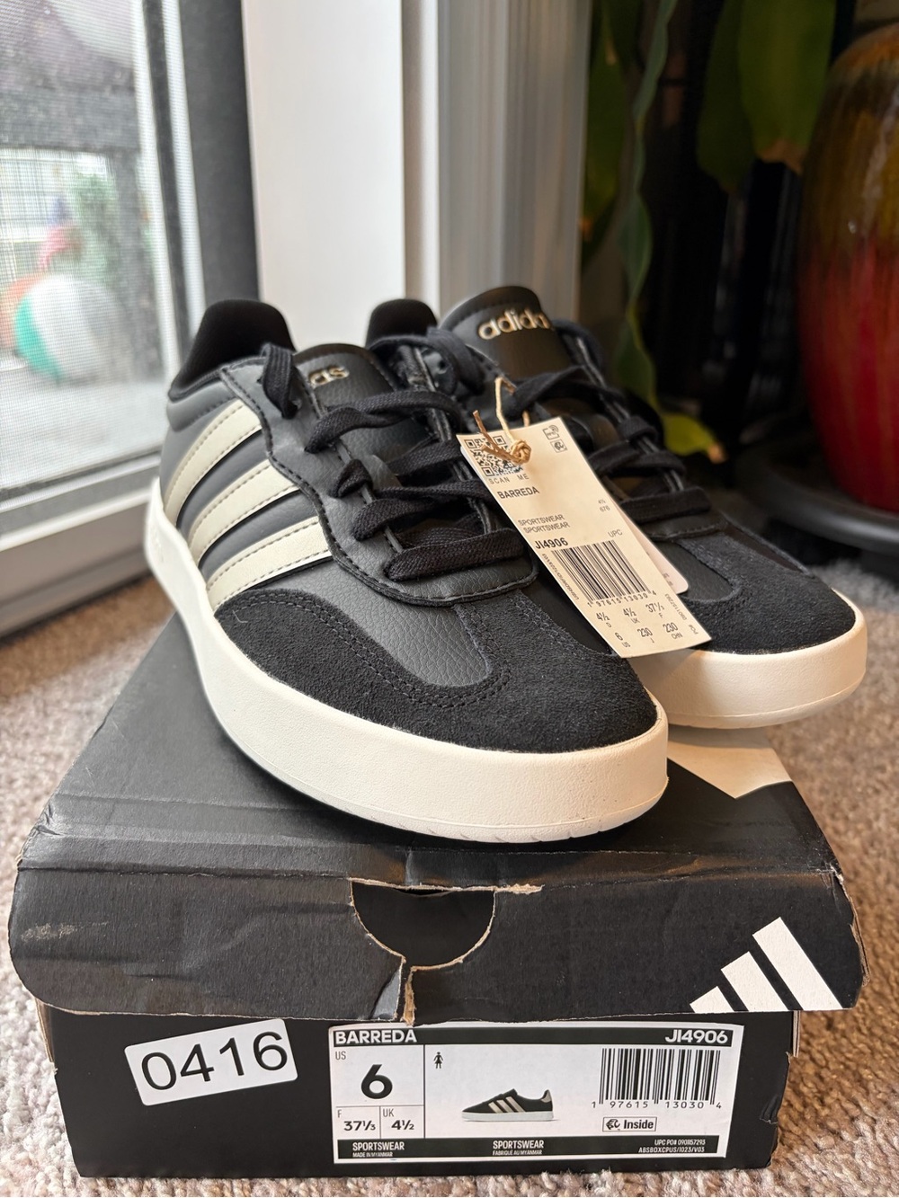 Women’s adidas Black and goldish/silver color Barreda Low-Top Sneakers